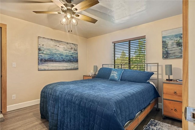31297 All View Dr, Running Springs, CA 92382 - bedroom with wood finished floors, baseboards, and ceiling fan