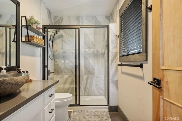 31297 All View Dr, Running Springs, CA 92382 - bathroom featuring vanity, toilet, and a marble finish shower