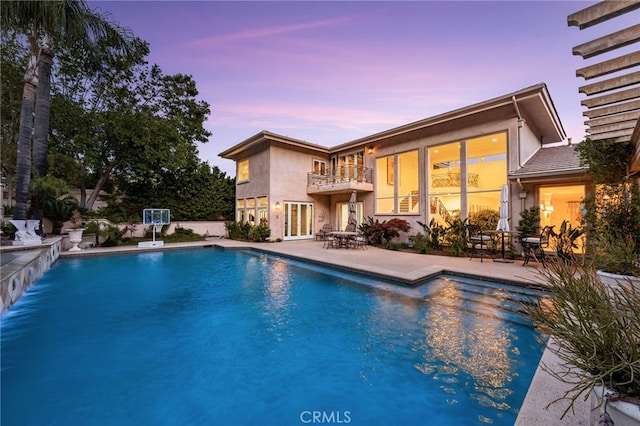 8790 King Ranch Rd, Rancho Cucamonga, CA 91701 - swimming pool with a patio and outdoor dining area
