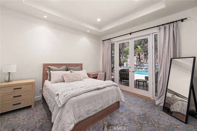 8790 King Ranch Rd, Rancho Cucamonga, CA 91701 - bedroom featuring access to outside, recessed lighting, a raised ceiling, french doors, and carpet floors
