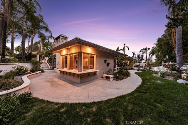8790 King Ranch Rd, Rancho Cucamonga, CA 91701 - rear view of property with a patio area and stairway