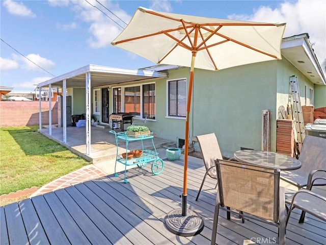 9513 Prichard St, Bellflower, CA 90706 - wooden terrace with outdoor dining area, a patio area, and a grill