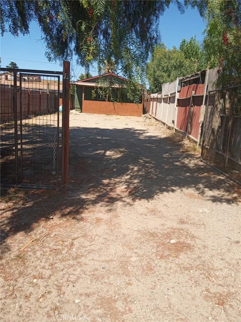 53612 Main St, San Lucas, CA 93954 - view of yard with dirt driveway