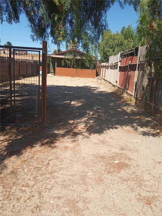 53612 Main St, San Lucas, CA 93954 - view of yard with dirt driveway