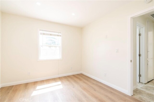 5402 N Fairvalley Ave, Covina, CA 91722 - empty room featuring light wood-type flooring and recessed lighting