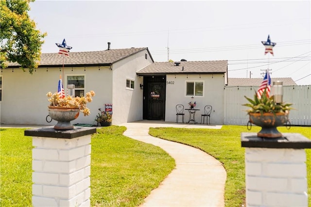 5402 N Fairvalley Ave, Covina, CA 91722 - rear view of house with stucco siding and roof with shingles