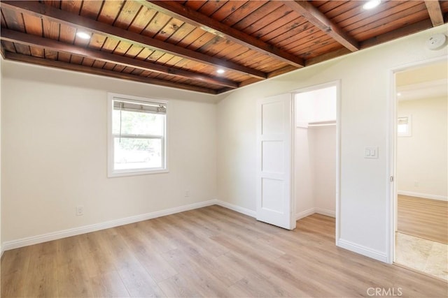 5402 N Fairvalley Ave, Covina, CA 91722 - unfurnished bedroom with a wooden ceiling with exposed beams, light wood-style floors, a closet, and recessed lighting