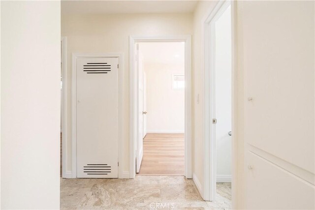 5402 N Fairvalley Ave, Covina, CA 91722 - hallway featuring a heating unit and baseboards