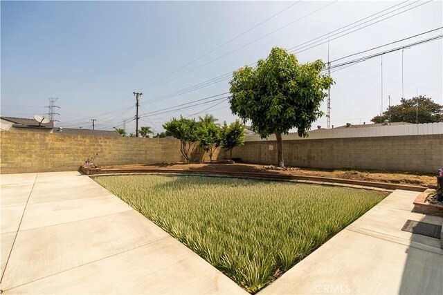 5402 N Fairvalley Ave, Covina, CA 91722 - fenced backyard featuring a patio