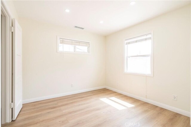 5402 N Fairvalley Ave, Covina, CA 91722 - unfurnished bedroom with light wood finished floors and recessed lighting