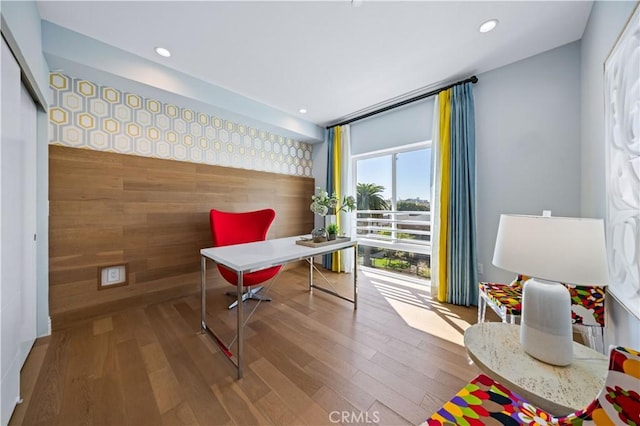 2939 Leeward Ave Unit 415, Los Angeles, CA 90005 - home office featuring an accent wall, wood finished floors, and recessed lighting