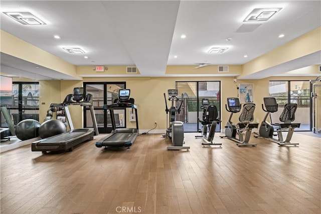 2939 Leeward Ave Unit 415, Los Angeles, CA 90005 - workout area with wood-type flooring, plenty of natural light, and recessed lighting