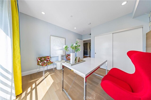 2939 Leeward Ave Unit 415, Los Angeles, CA 90005 - office area with wood finished floors, baseboards, and recessed lighting