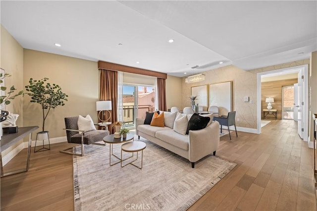 2939 Leeward Ave Unit 415, Los Angeles, CA 90005 - living area with wood finished floors, baseboards, and recessed lighting