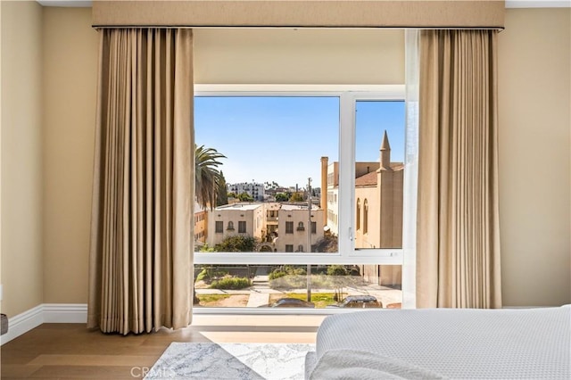 2939 Leeward Ave Unit 415, Los Angeles, CA 90005 - bedroom with wood finished floors and baseboards