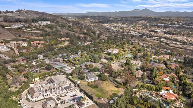 31593 Aguacate Rd, San Juan Capistrano, CA 92675 - aerial view of property and surrounding area with a mountain backdrop and nearby suburban area