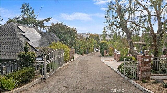 31593 Aguacate Rd, San Juan Capistrano, CA 92675 - view of street featuring a gated entry