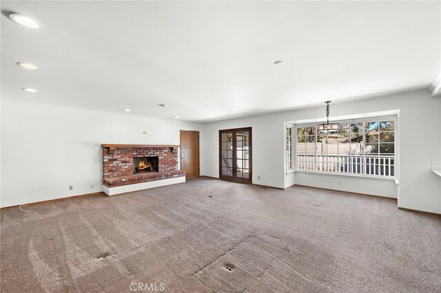 31593 Aguacate Rd, San Juan Capistrano, CA 92675 - unfurnished living room with recessed lighting, carpet floors, baseboards, and a fireplace