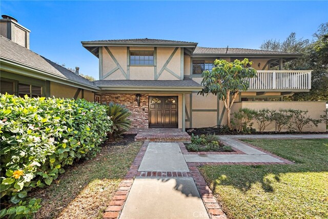 31593 Aguacate Rd, San Juan Capistrano, CA 92675 - view of front of property with stucco siding and a front lawn