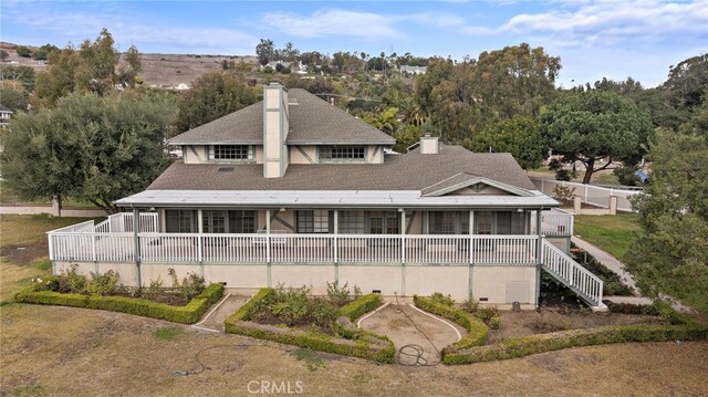 31593 Aguacate Rd, San Juan Capistrano, CA 92675 - back of property featuring a chimney, stucco siding, and a shingled roof