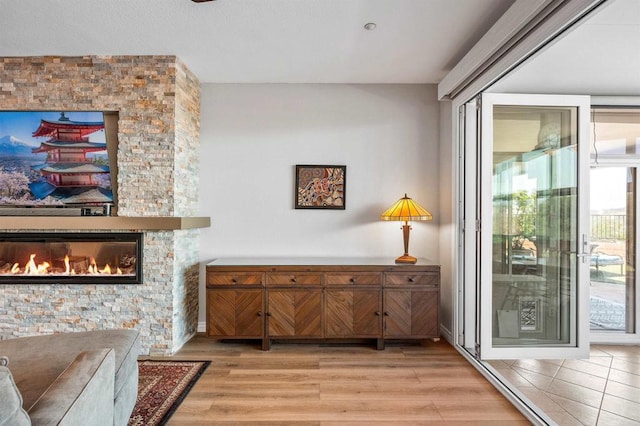 1139 Prussian, Oceanside, CA 92057 - interior space with light wood-type flooring and a fireplace
