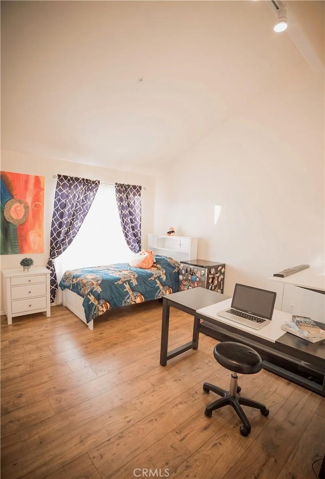 136541/2 Dronfield Ave, Sylmar, CA 91342 - bedroom featuring hardwood / wood-style floors and an office area