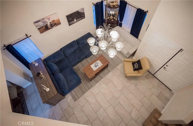 136541/2 Dronfield Ave, Sylmar, CA 91342 - living room featuring tile patterned floors and a chandelier