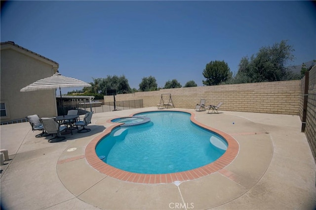 136541/2 Dronfield Ave, Sylmar, CA 91342 - view of swimming pool featuring a fenced backyard, a patio, and a pool with connected hot tub