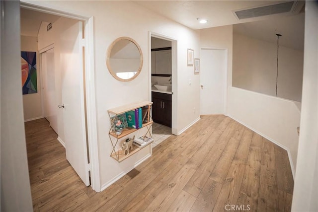 136541/2 Dronfield Ave, Sylmar, CA 91342 - corridor featuring light wood-type flooring