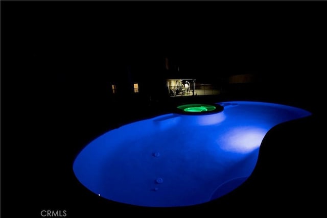 136541/2 Dronfield Ave, Sylmar, CA 91342 - pool at twilight featuring a pool with connected hot tub