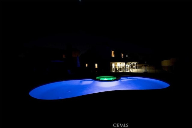 136541/2 Dronfield Ave, Sylmar, CA 91342 - pool at twilight featuring a patio and a pool with connected hot tub