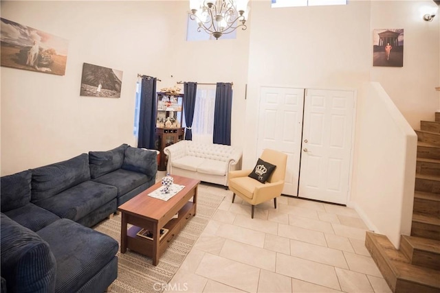 136541/2 Dronfield Ave, Sylmar, CA 91342 - living room featuring a chandelier, a towering ceiling, and light tile patterned floors