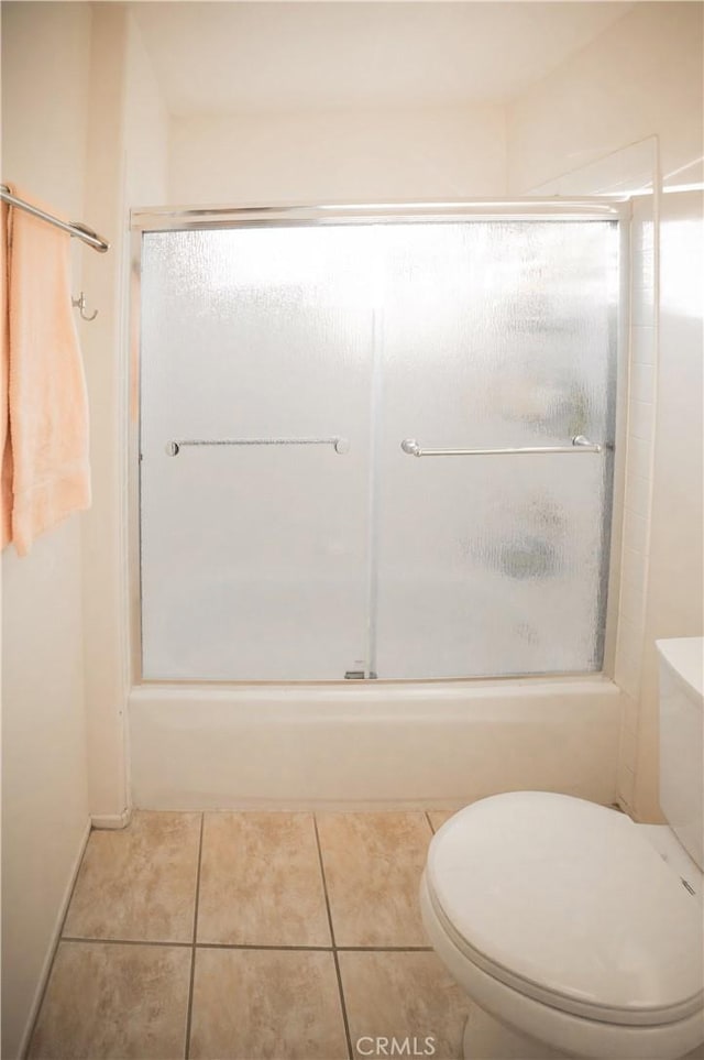 136541/2 Dronfield Ave, Sylmar, CA 91342 - full bath with toilet, tile patterned floors, and combined bath / shower with glass door