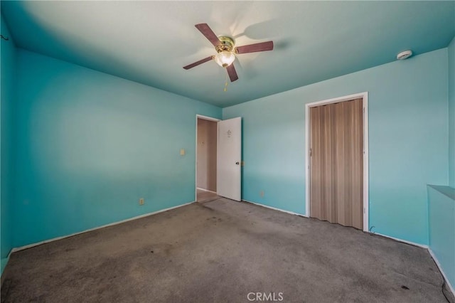 12410 Lakeview Dr, Clearlake Oaks, CA 95423 - unfurnished bedroom with carpet flooring, baseboards, and a closet