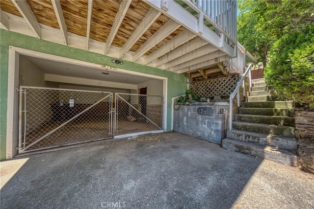 12410 Lakeview Dr, Clearlake Oaks, CA 95423 - garage featuring a gate