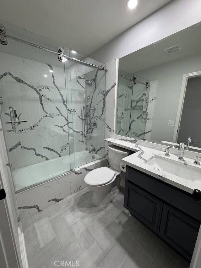 26433 Emerald Dove Dr, Valencia, CA 91355 - bathroom with combined bath / shower with glass door, toilet, vanity, and recessed lighting