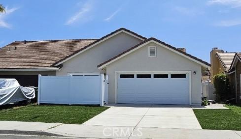 317 Pennyroyal Way, Oceanside, CA 92057 - single story home with concrete driveway, a garage, and stucco siding