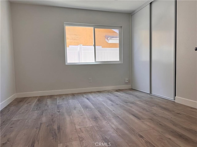 317 Pennyroyal Way, Oceanside, CA 92057 - unfurnished room with wood finished floors and baseboards