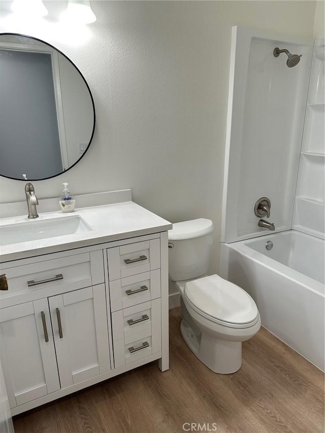 28802 El Canto Dr, Laguna Niguel, CA 92677 - full bath featuring wood finished floors, vanity, and bathtub / shower combination