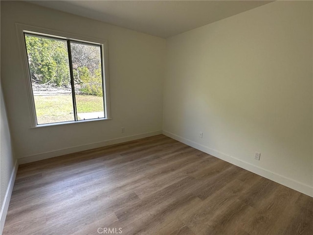 28802 El Canto Dr, Laguna Niguel, CA 92677 - unfurnished room with plenty of natural light and wood finished floors