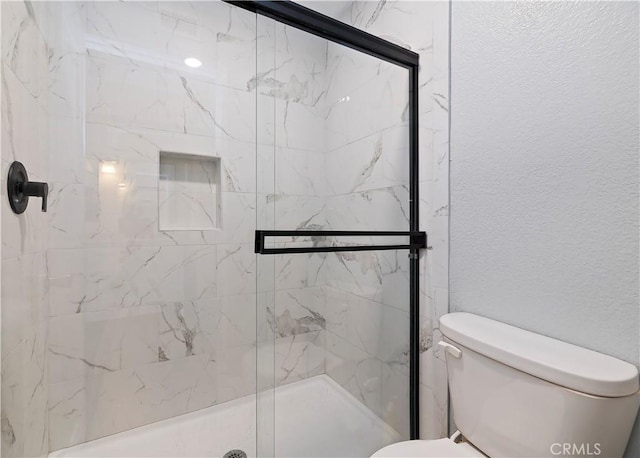 5996 Winncliff Dr, Jurupa Valley, CA 92509 - full bathroom with toilet and a marble finish shower