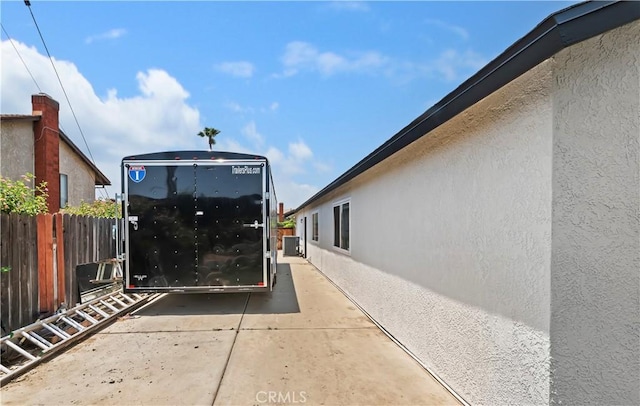 5996 Winncliff Dr, Jurupa Valley, CA 92509 - view of home's exterior with stucco siding and a patio