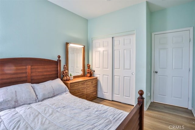13256 Garcia Ct, Rancho Cucamonga, CA 91739 - bedroom featuring a closet and wood finished floors