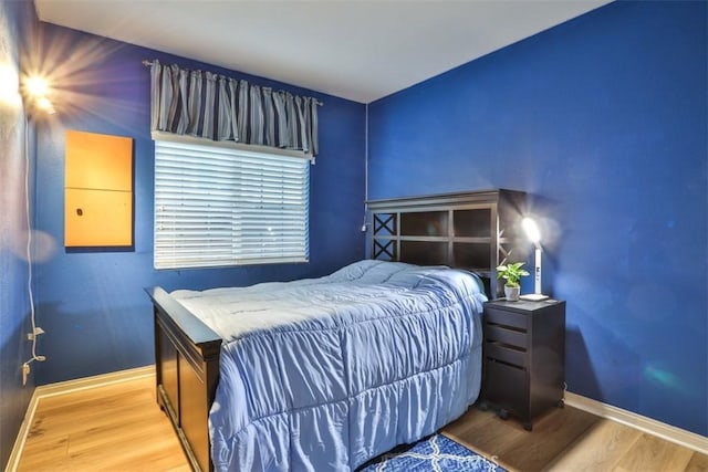 13256 Garcia Ct, Rancho Cucamonga, CA 91739 - bedroom featuring wood finished floors and baseboards