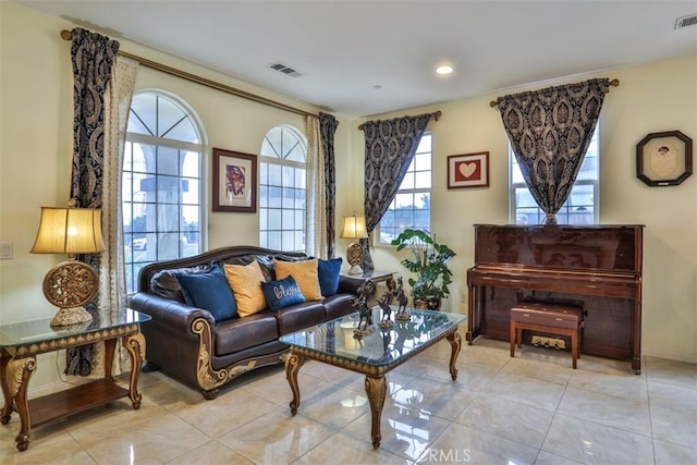 13256 Garcia Ct, Rancho Cucamonga, CA 91739 - living room featuring light tile patterned floors and baseboards