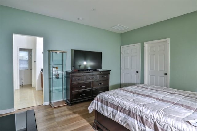 13256 Garcia Ct, Rancho Cucamonga, CA 91739 - bedroom featuring wood finished floors