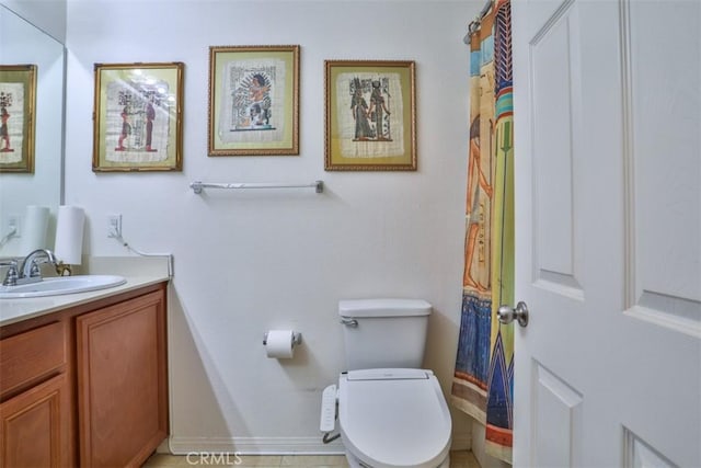 13256 Garcia Ct, Rancho Cucamonga, CA 91739 - bathroom with vanity, toilet, and baseboards