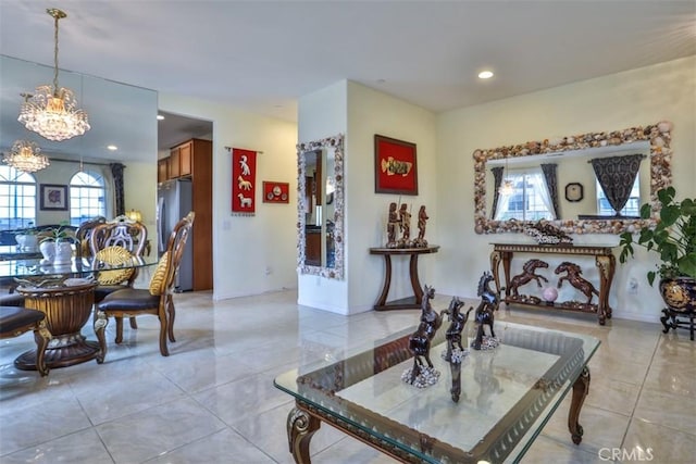 13256 Garcia Ct, Rancho Cucamonga, CA 91739 - living room with a chandelier, light tile patterned flooring, recessed lighting, and baseboards