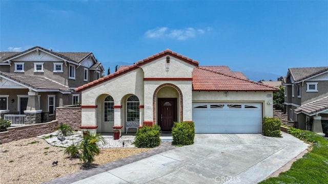 13256 Garcia Ct, Rancho Cucamonga, CA 91739 - view of front of property featuring stucco siding, a garage, driveway, a tiled roof, and covered porch