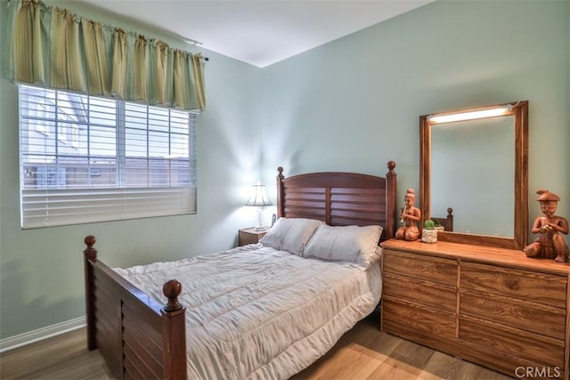 13256 Garcia Ct, Rancho Cucamonga, CA 91739 - bedroom with wood finished floors and baseboards
